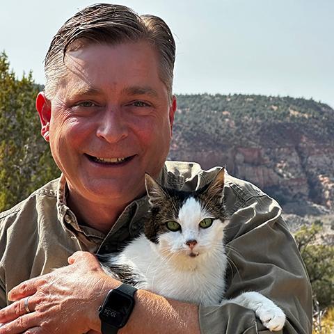 Mark Ebbs with a cat