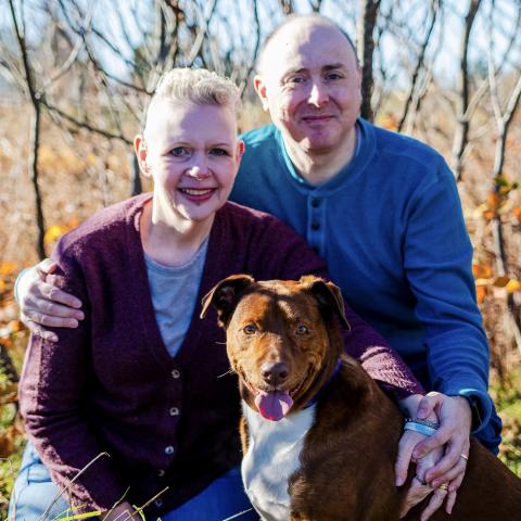 Melissa B. pictured here with husband Grahame and their dog, Hex