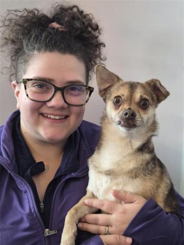 Karlie Repp with a small brown dog