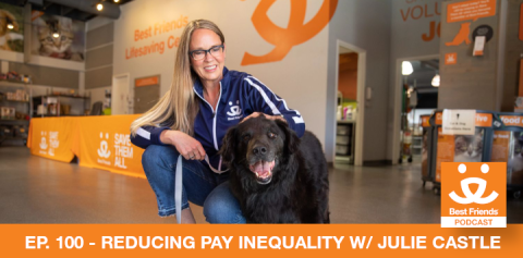 Julie Castle CEO Best Friends Animal Society with a black dog