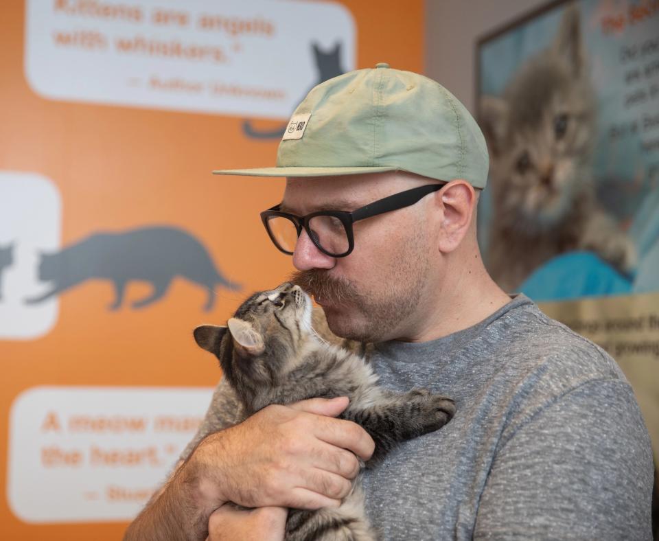 Foster https://bestfriends.org/adopt-and-foster/foster-kittens kissing a brown tabby kitten
