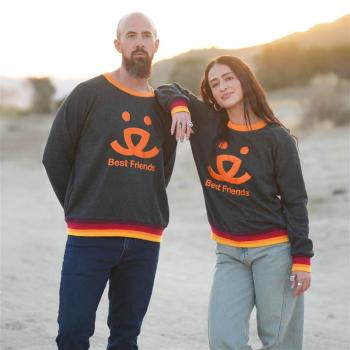 Two people wearing Best Friends logo sweatshirts