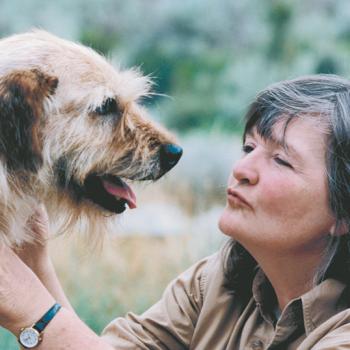 Best Friends co-founder Faith Maloney with a dog