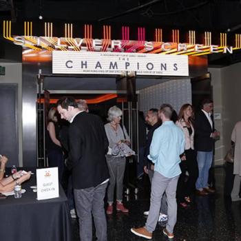 People at theater waiting to see The Champions movie