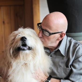 Francis Battista with Teddy the dog