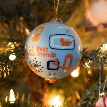 Best Friends round ball ornament on a tree