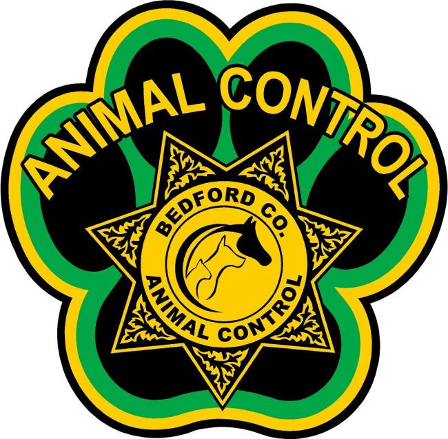 Bedford County Animal Control, (Shelbyville, Tennessee), logo black, green and yellow pawprint with sheriff's star on top of paw pad and yellow text above