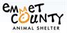 Emmet County Animal Shelter (Estherville, Iowa) logo with of 'M' & 'O' of Emmet County in yellow & forming animal head