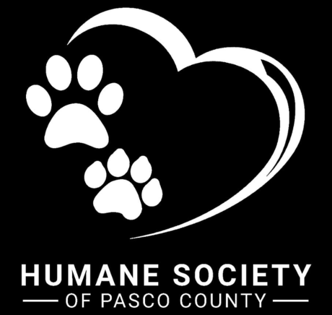 Humane Society of Pasco County (Shady Hills, Florida) logo of white heart with two paws prints on the left above org name