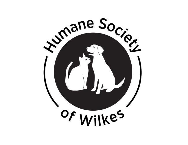Humane Society of Wilkes (North Wilkesboro, North Carolina) logo black filled circle with drawn white cat and dog with black accents circle surrounded by black lettering