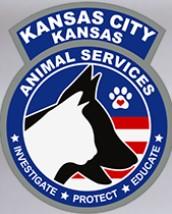 Kansas City Kansas Animal Control, (Kansas City, Kansas), logo white cat in front of black dog in front of blue red and white background with white text