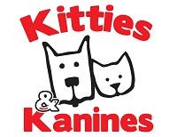 Friends of Kitties & Kanines (Fort Smith, Arkansas) logo outline drawing of dog & cat face with red "Kitties & Kanines"