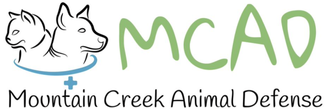 Mountain Creek Animal Defense, (Riverton, Utah) logo cat and dog profiles in black outlines then MCAD in green letters  