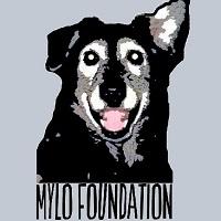 The Mylo Foundation (Milton, Florida) | logo of black, white, grey dog, text The Mylo Foundation