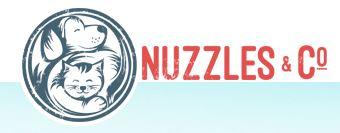 Nuzzles & Co. (Park City, Utah)  of dog and cat hugging, black-and-white silhouette, circle, nuzzles & co in red 