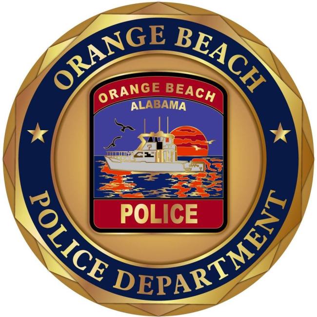 Orange Beach Animal Care and Control Program, (Orange Beach, Alabama), city logo of boat on water with sunset in background surrounded by gold and blue ring with gold text
