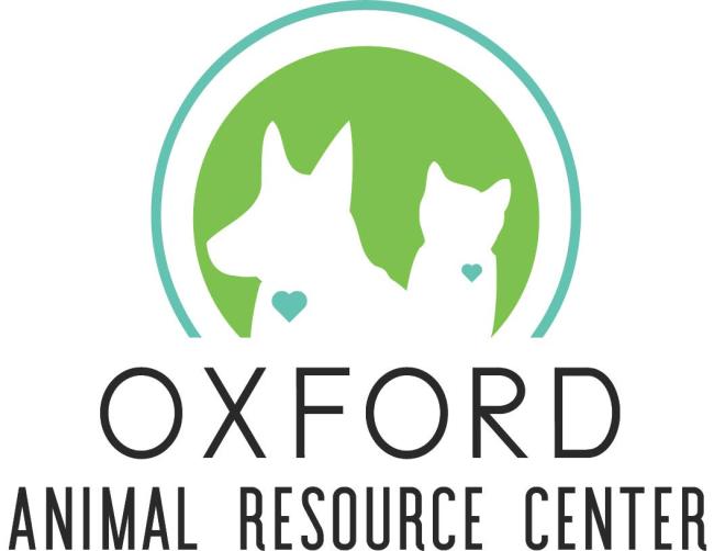 Oxford Animal Resource Center (Oxford, Mississippi) logo aqua circle outline with flat bottom inner green circle with flat bottom white dog and cat outline inset each with aqua heart black lettering below