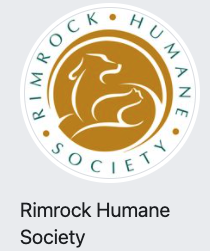 Rimrock Humane Society, (Roundup, Montana), logo is white circle with name in blue inside with stylized dog and cat in brown  