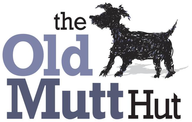 The Old Mutt Hut (Colorado Springs, Colorado) logo white backdrop with scribbled black and bits of greyish blue dog large lettering of black and greyish blue to the left