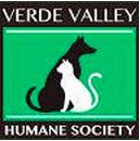 Verde Valley Humane Society (Cottonwood, Arizona) logo is a white cat sitting in front of a black dog with a green background