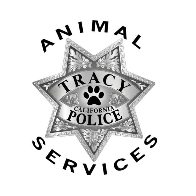 City of Tracy Animal Services (Tracy, California) logo with silver shield with black paw print
