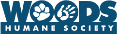 Woods Humane Society (San Luis Obispo, California) logo is the org name with a pawprint and a hand in the o’s in “Woods”