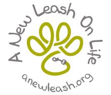 A New Leash on Life, Inc (Brownsboro, Alabama) logo green outline of paw surrounded by text