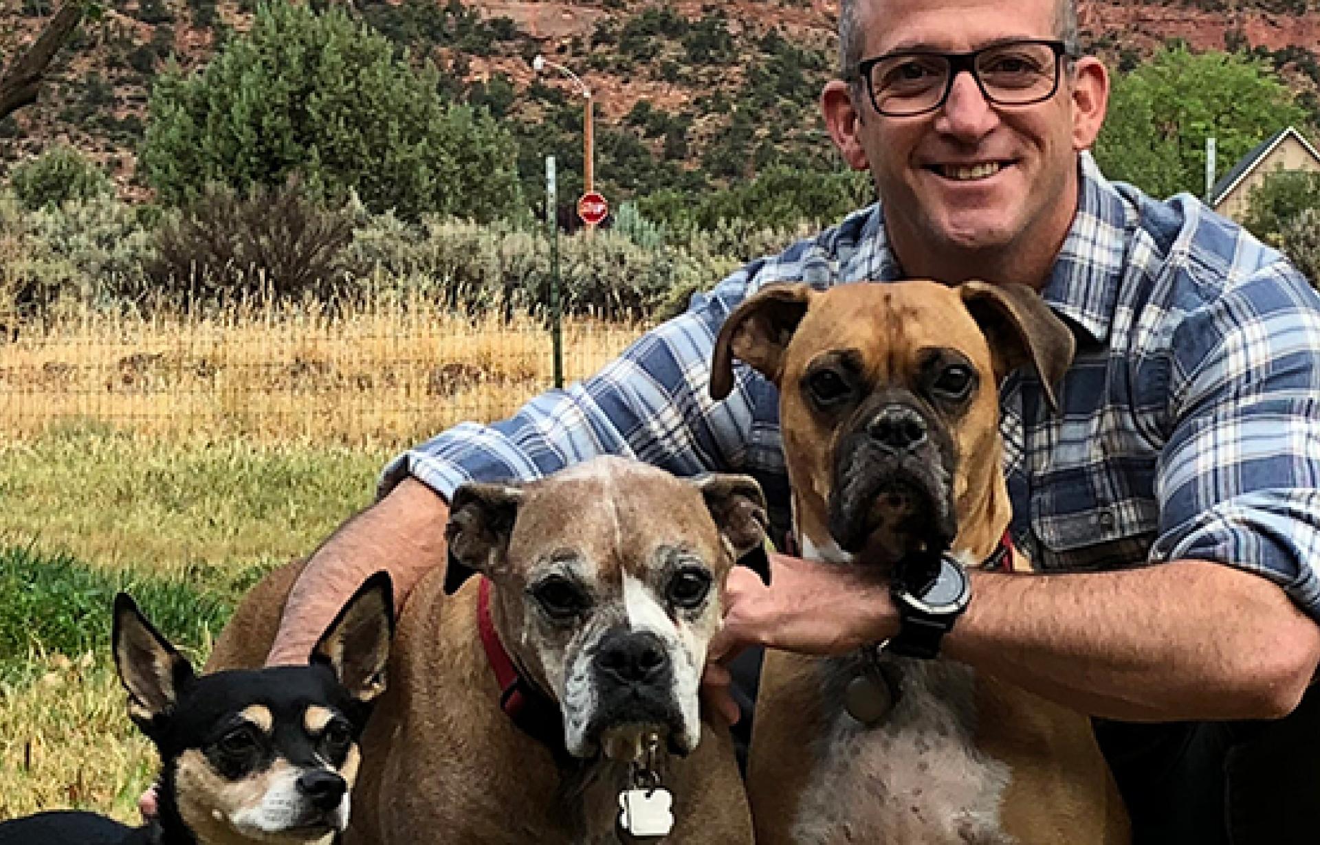 Bart Battista with three dogs