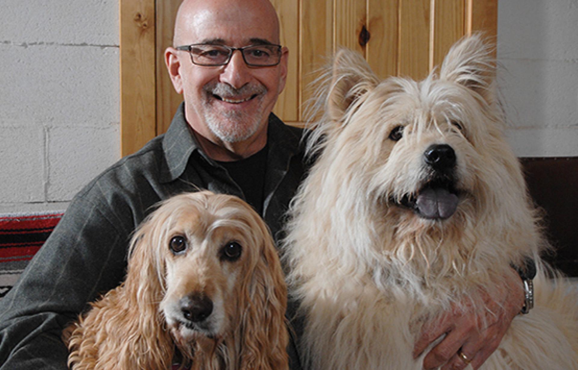 Francis Battista with two dogs