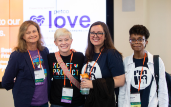 Four attendees to the 2022 Best Friends National Conference pose for a photo