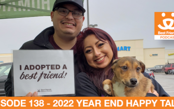 A man and woman celebrating the adoption of a dog with a sign that says &quot;I adopted my best friend&quot;