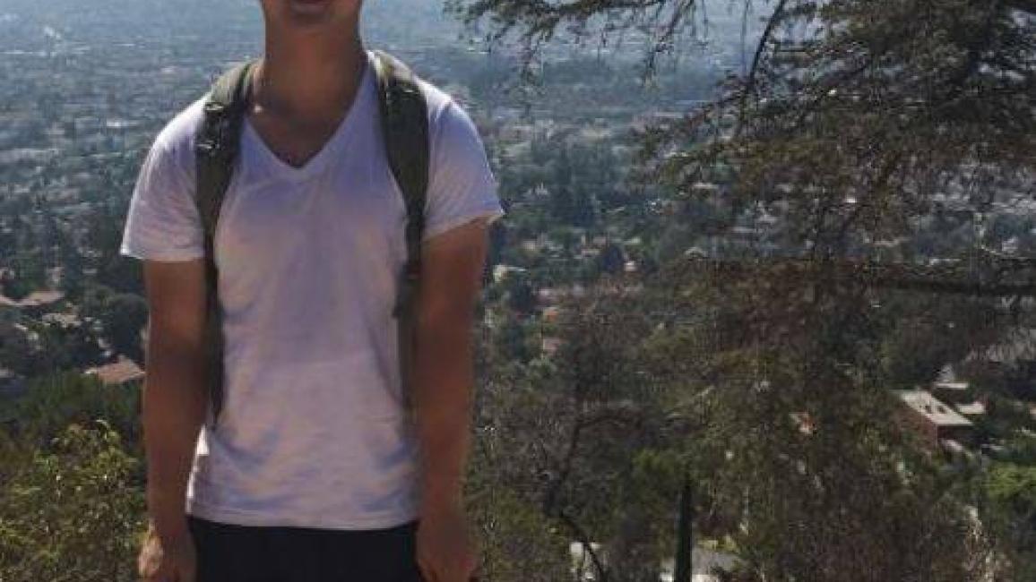 Volunteer Brian walking a dog