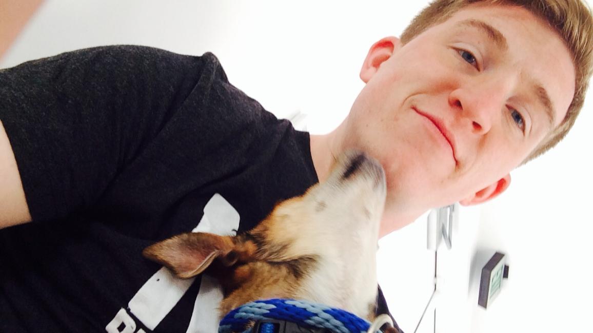 Volunteer Clinton Downs with his dog