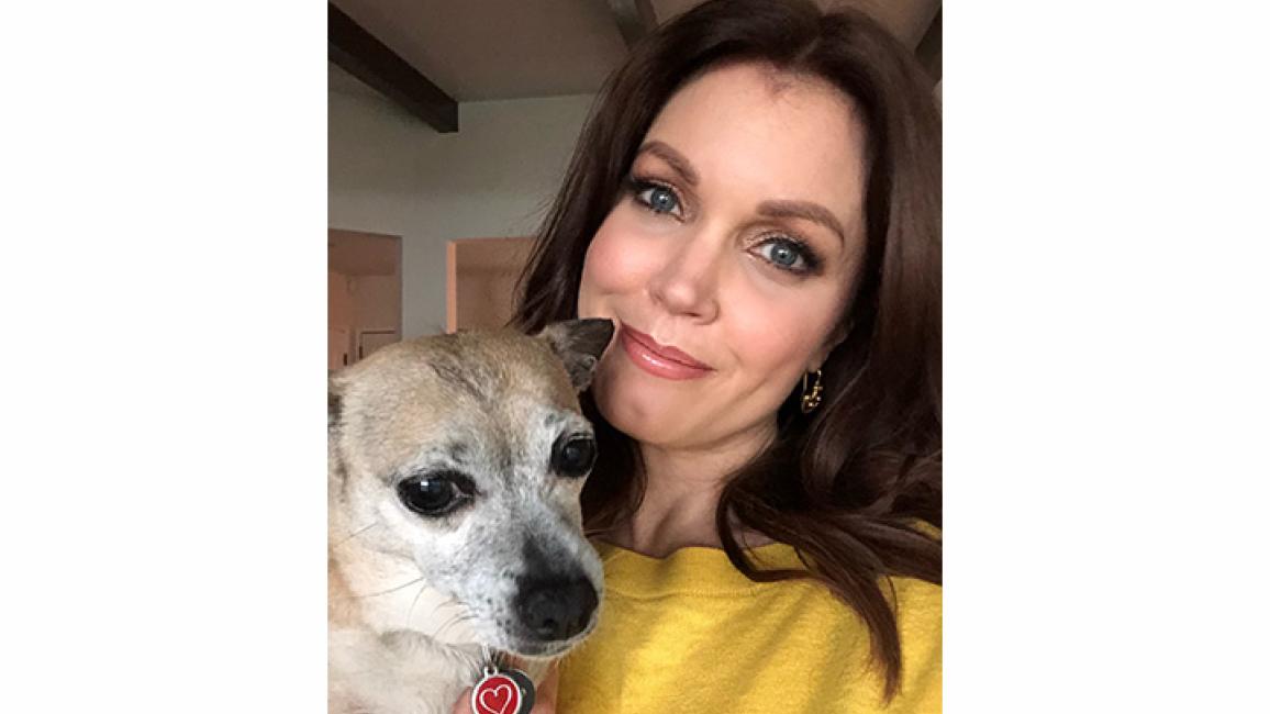 Bellamy Young holding a dog