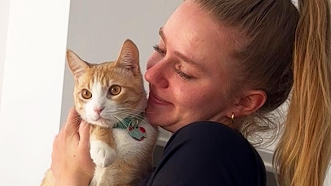 Anna holding Butters the cat