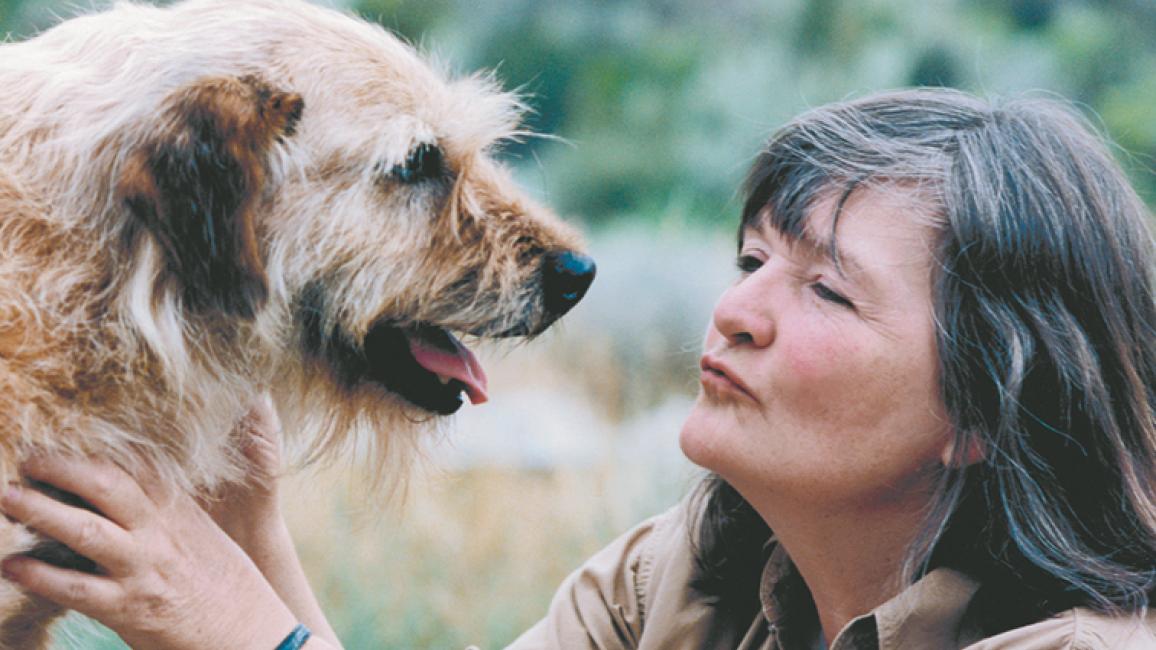 Faith Maloney, co-founder of Best Friends Animal Society, with a scruffy dog