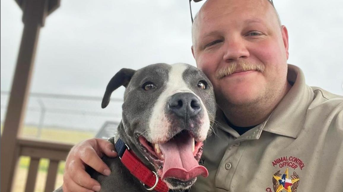 Mitch Turner-Beasley, a La Porte animal control officer, with Hester the dog