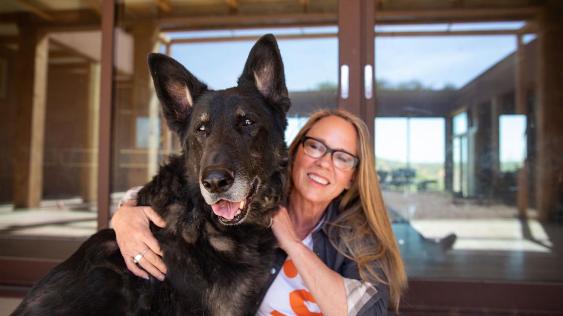 Best Friends CEO Julie Castle with her dog Shadow