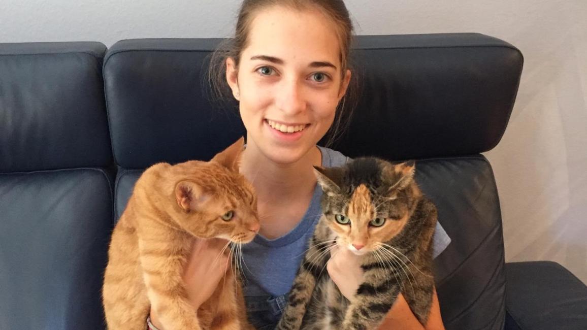 Best Friends in L.A. teen volunteer Keely with two cats