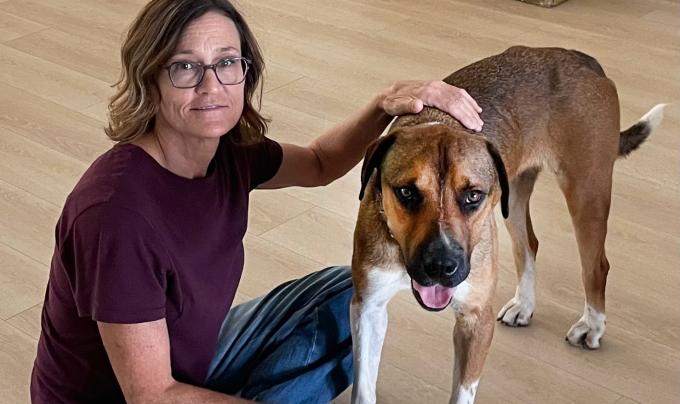 Kevin the dog with his adopter