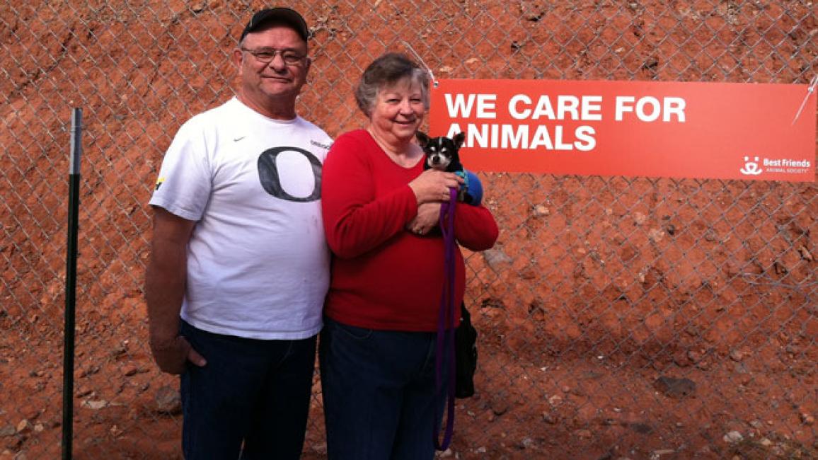 Couple with their adopted dog