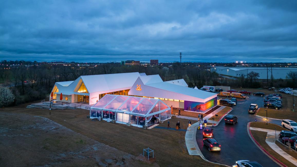 The outside of the Best Friends Pet Resource Center in Northwest Arkansas at dusk
