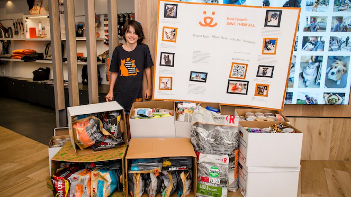 Melodie at the Pet Adoption Center with her donations