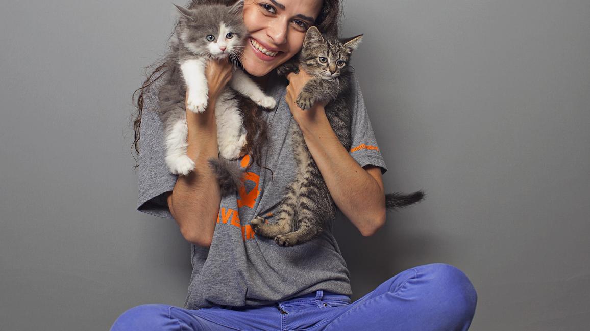 Stephanie Nogueras with kittens