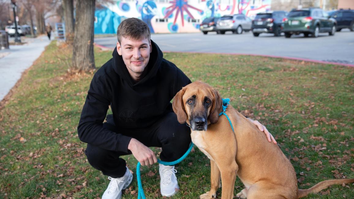 Kyle Filipowski with Topino the dog