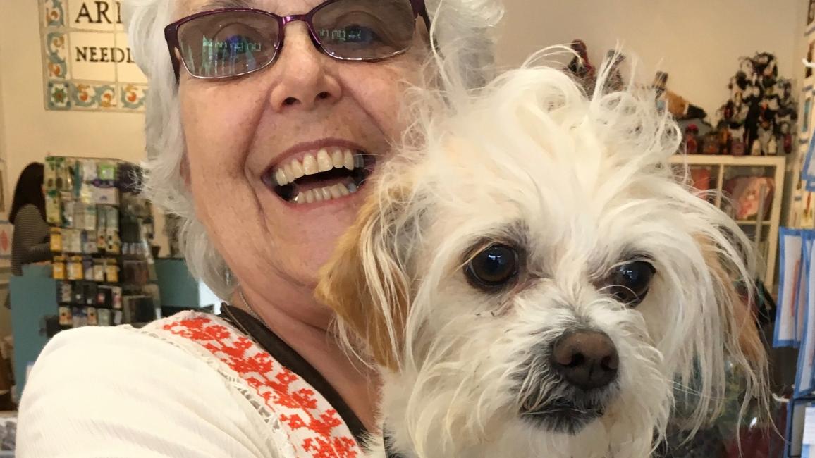 Best Friends volunteer Barbara C. with a dog