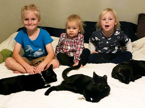 All three kids with all three kittens