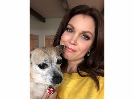 Bellamy Young holding a dog