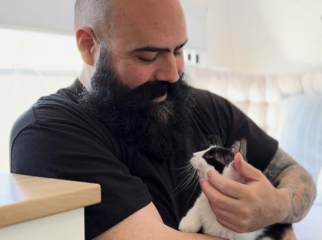 Chris with Orpha the cat