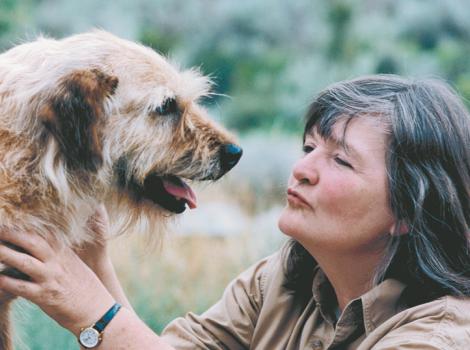 Faith Maloney, co-founder of Best Friends Animal Society, with a scruffy dog